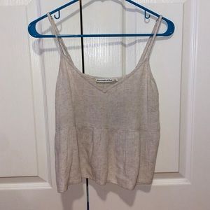 Small, tan, flowy Abercrombie tank